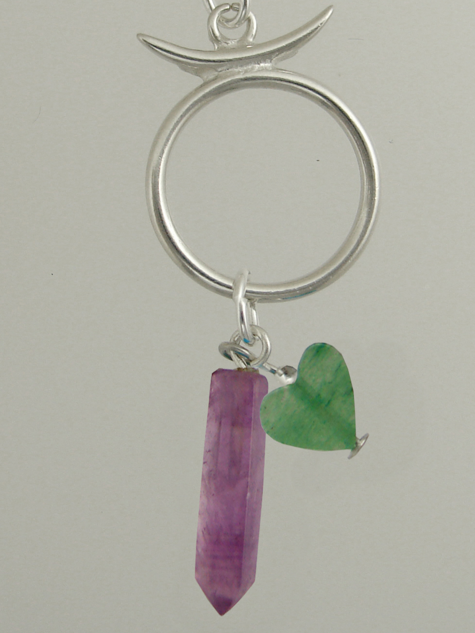 Sterling Silver Taurus Pendant Necklace With an Amethyst Crystal And Green Heart